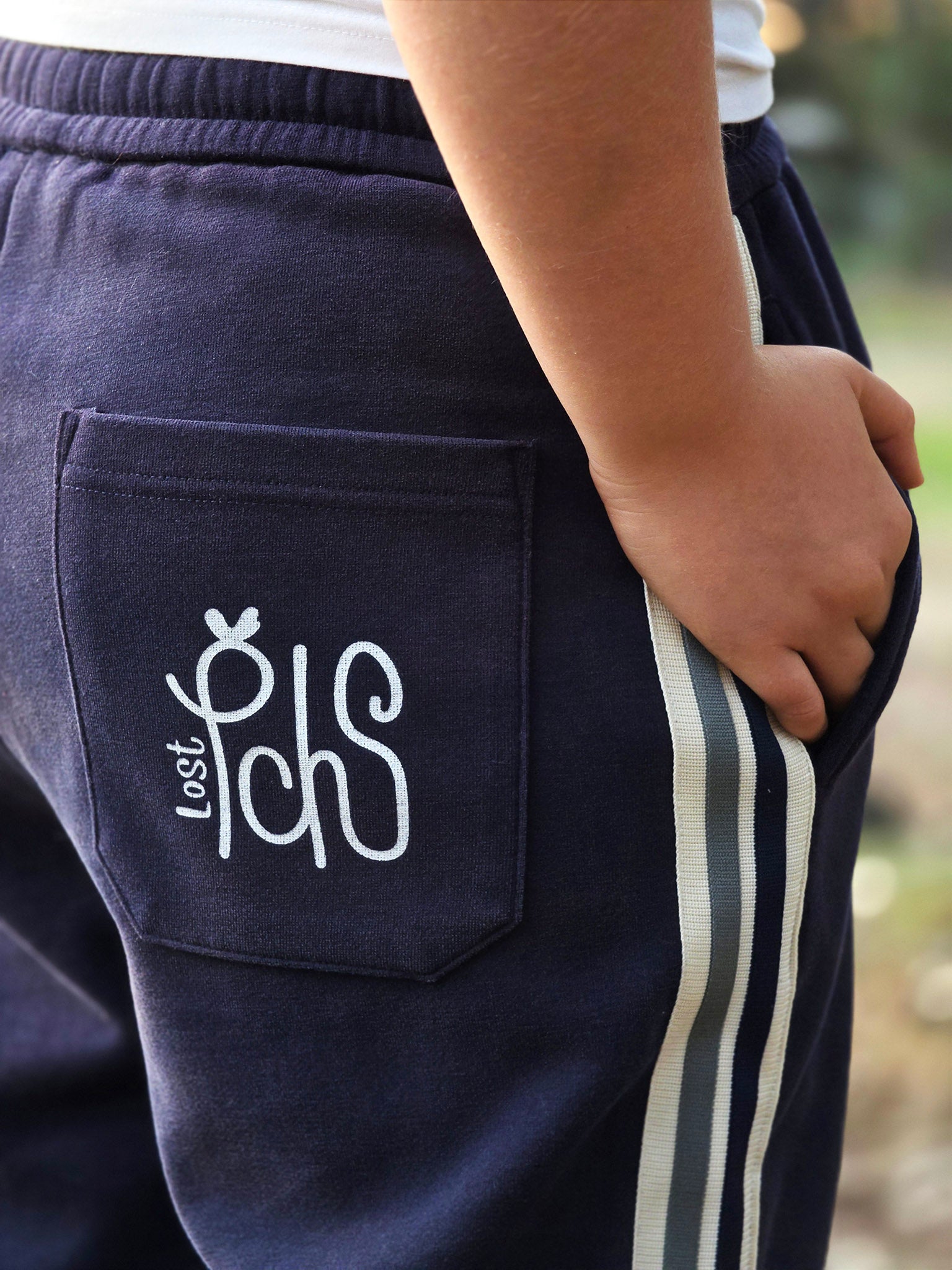 Lost Peaches Boutique Navy OG Retro Track Pants – pocket detail, straight-leg trackies for women